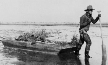 Leopold pulling a raft in Rio Grande for hunting