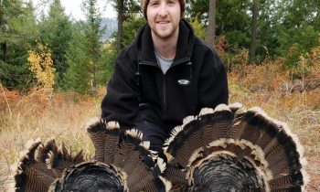 Cole with two turkeys