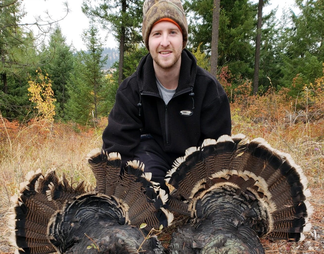 Cole with two turkeys